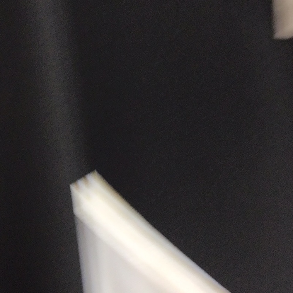 ONE PIECE TANK TOP THAT LOOKS LIKE TWO PIECES.  BLACK AND WHITE - Picture 3 of 10